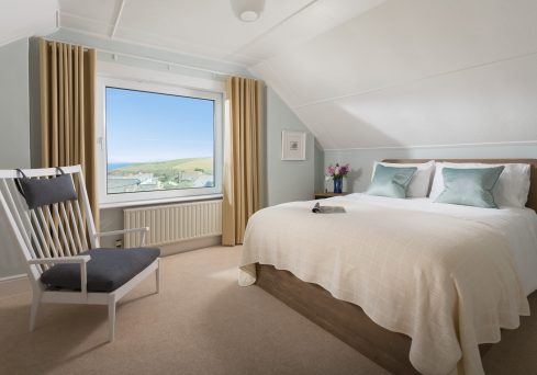 Interior designed master bedroom with coastal inspired interiors by Tracey Mannell